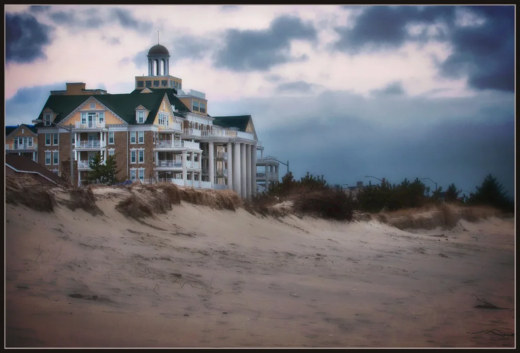 The Essex and Sussex building seen across the sand from the Spring Lake beach