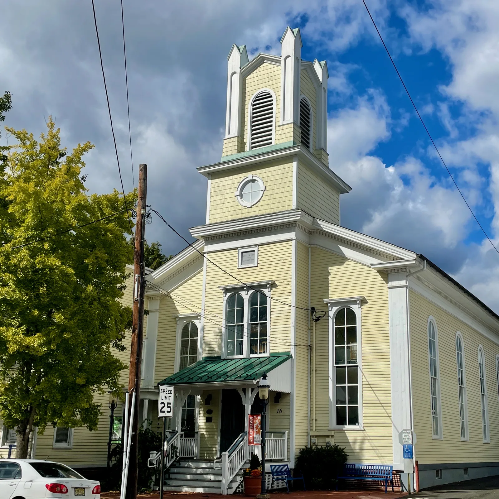 The yellow former First Baptist Church on South Main Street, now the Allentown public library