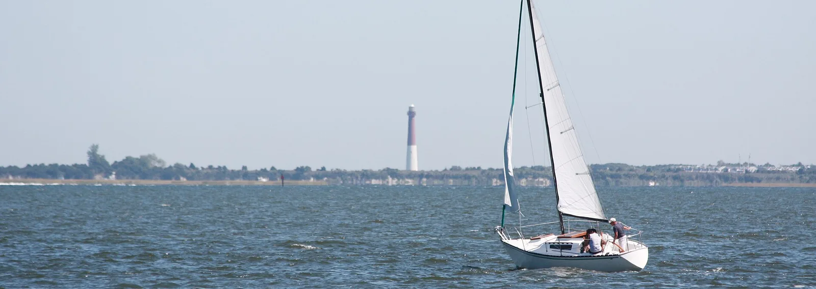 Barnegat Bay from the bay end of East Bay Avenue in Barnegat, with Barnegat Lighthouse on Long Beach Island in the distance