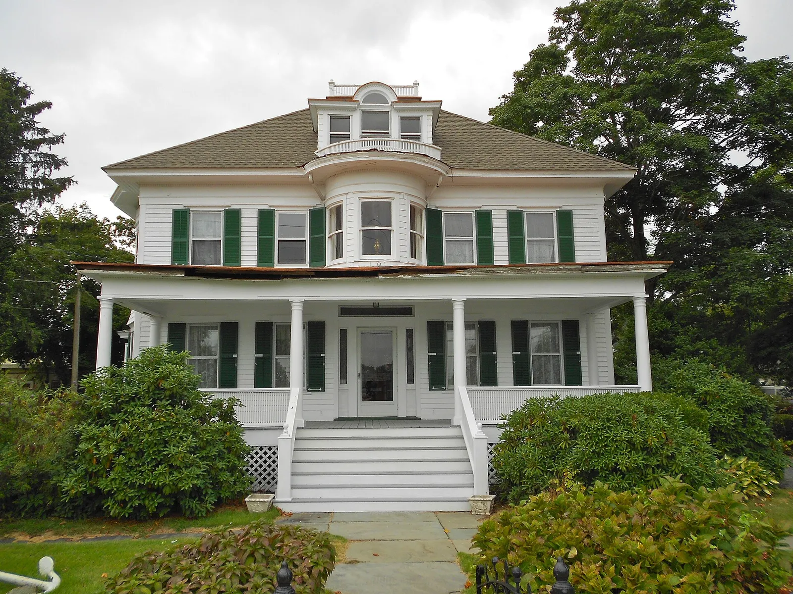 The white two-story Mary Etta Cox House on North Main Street, listed on the National Register of Historic Places