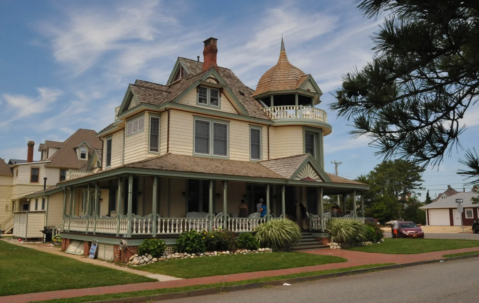 Converse Cottage, a Victorian house with a turret and wraparound porch in Beach Haven