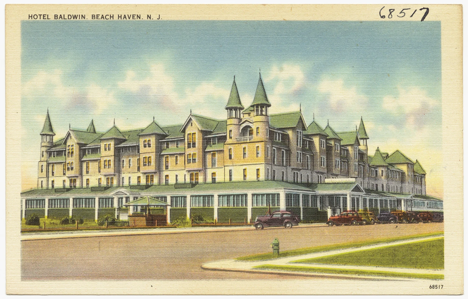 Vintage postcard of the Hotel Baldwin, a huge turreted Victorian resort hotel with long porches
