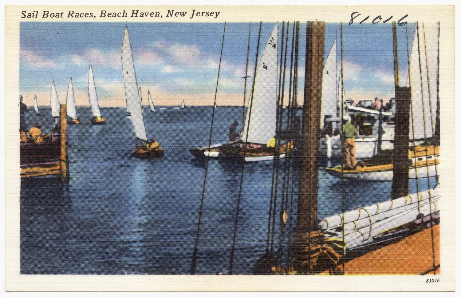 Colorful vintage postcard of sailboats racing on blue bay water past a dock lined with moored boats