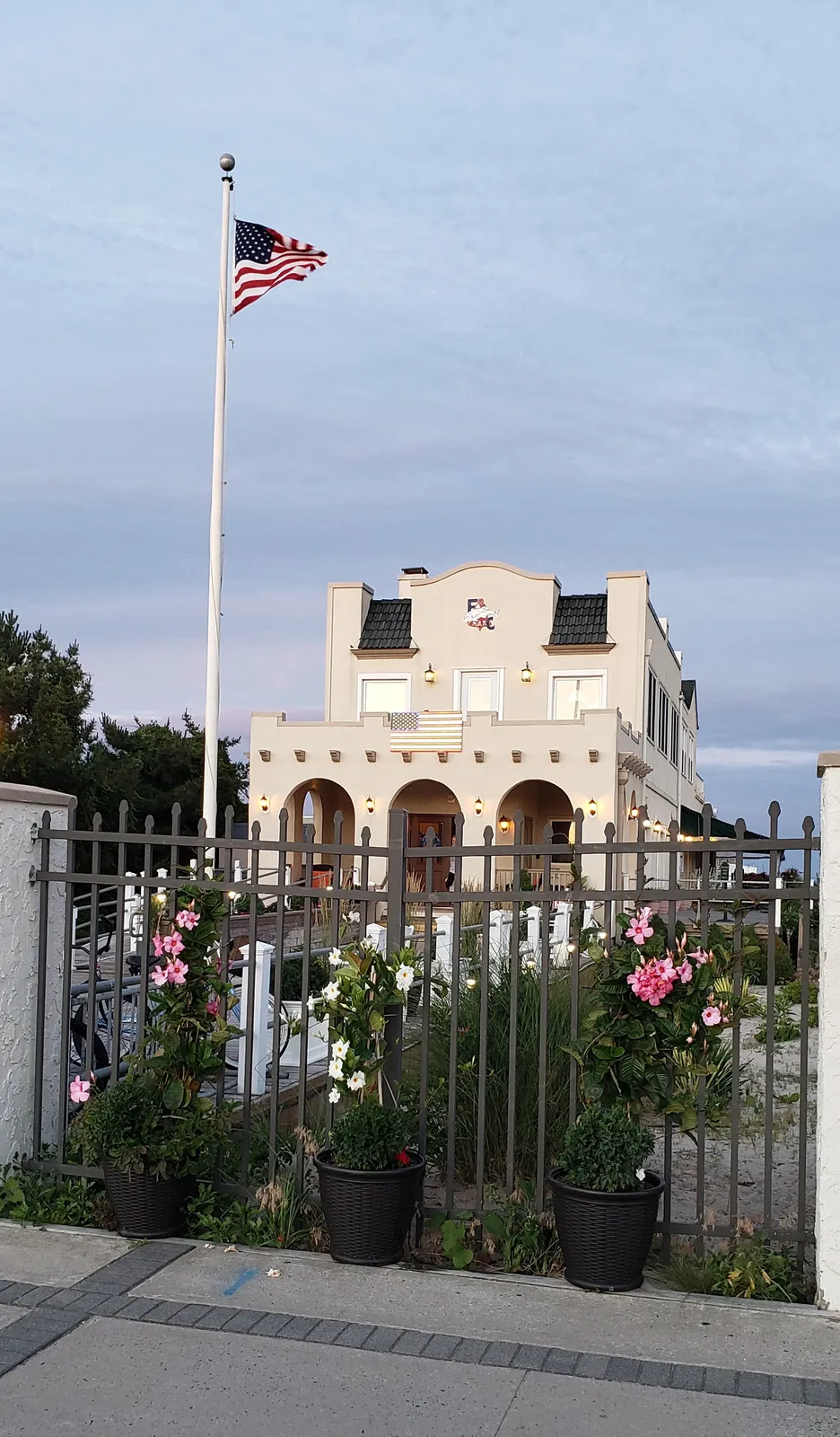 The Belmar Fishing Club building and pier at the ocean