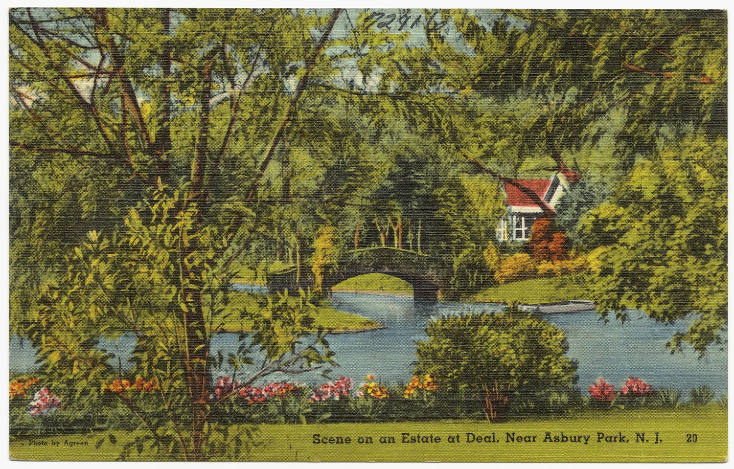 Vintage linen postcard of a garden estate in Deal with a pond, an arched footbridge and a red-roofed house among trees