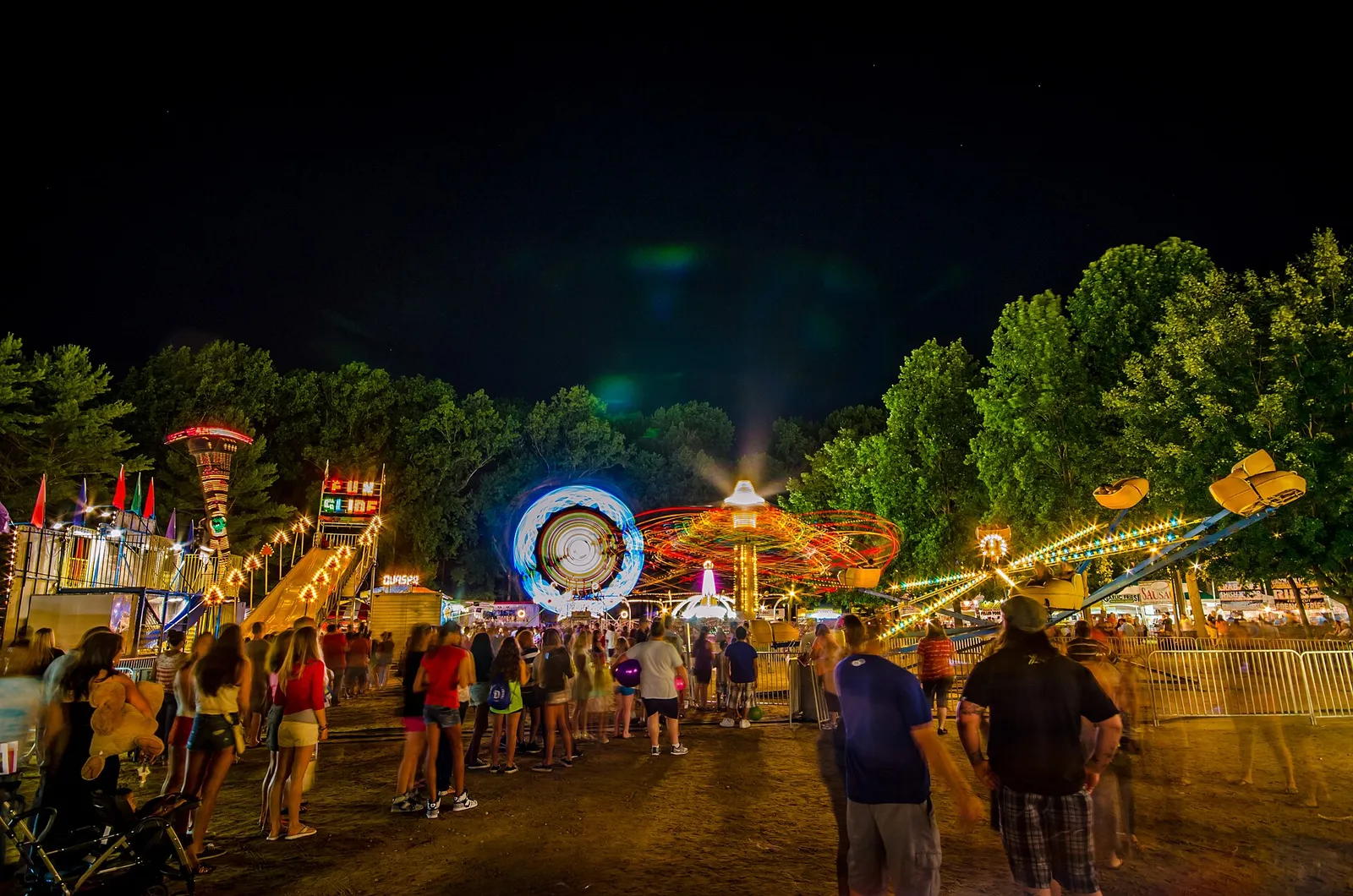 Lit carnival rides at night at the Monmouth County Fair