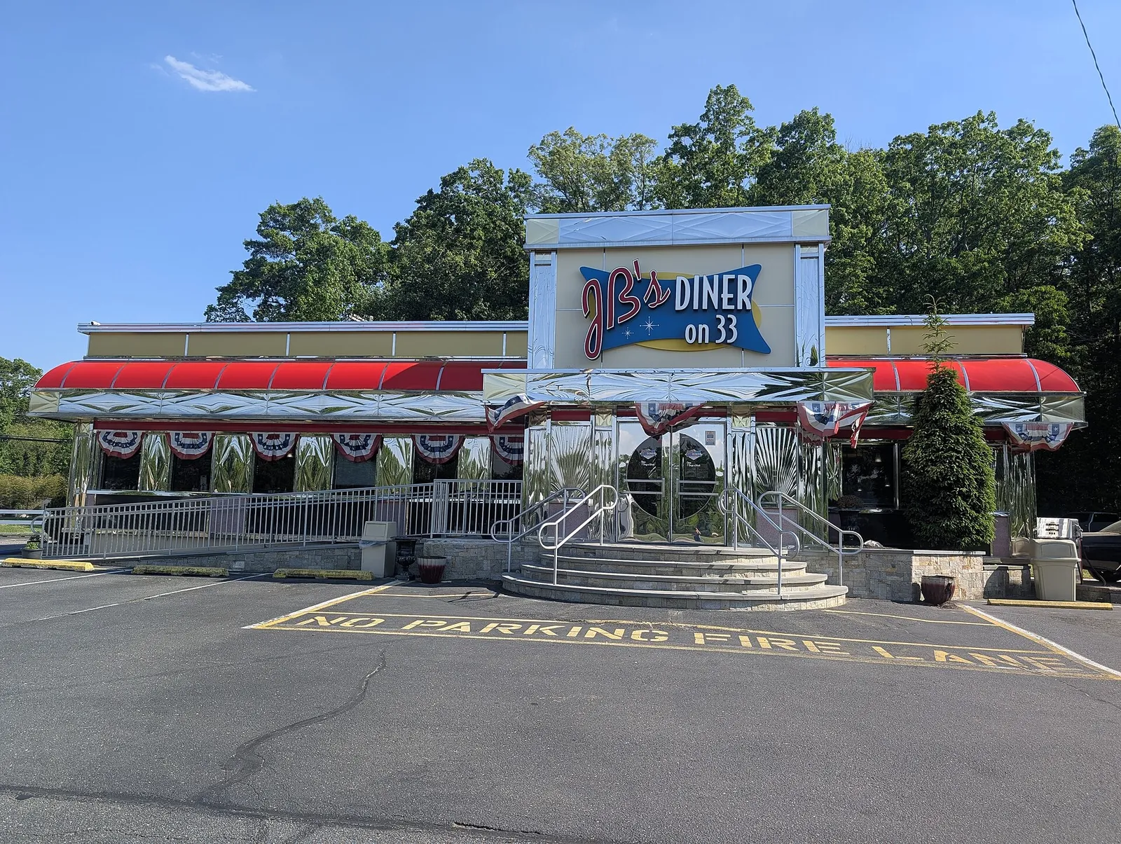JB's Diner on 33, a chrome diner with a red awning and flag bunting