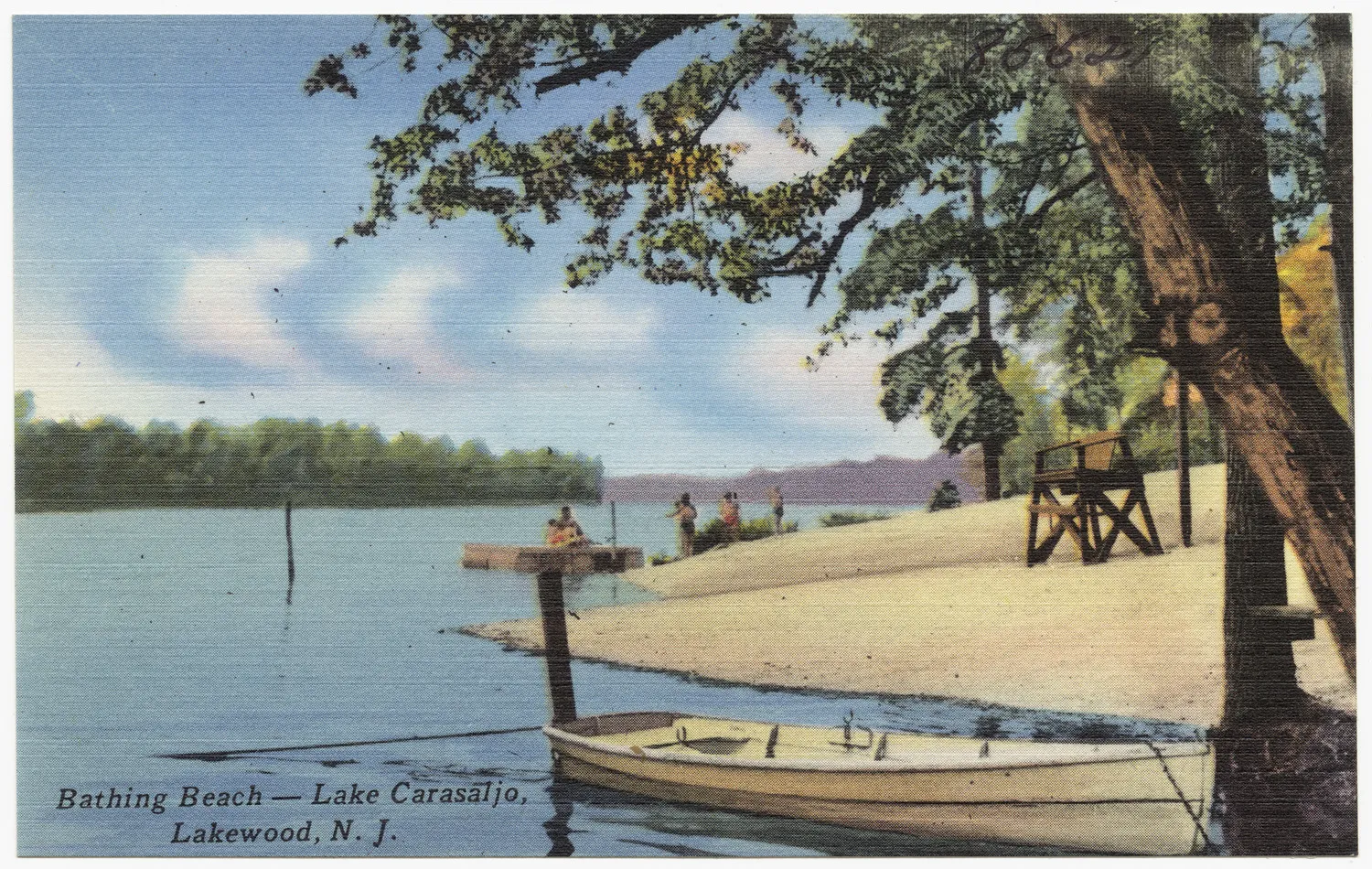 Vintage postcard of a small sandy beach on a lake with a rowboat and a lifeguard stand under trees