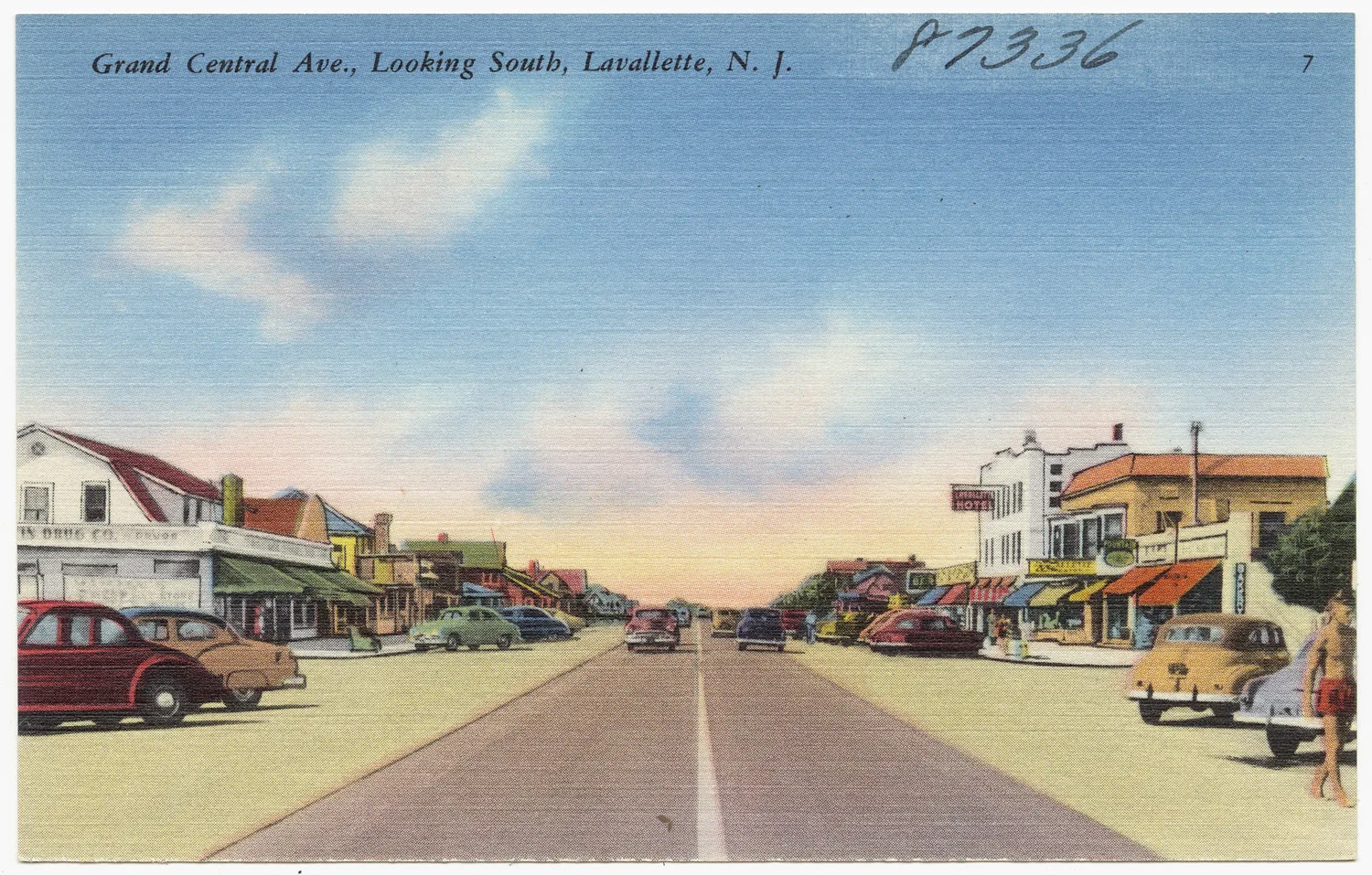 Vintage postcard of Grand Central Avenue in Lavallette lined with shops and parked cars, looking south
