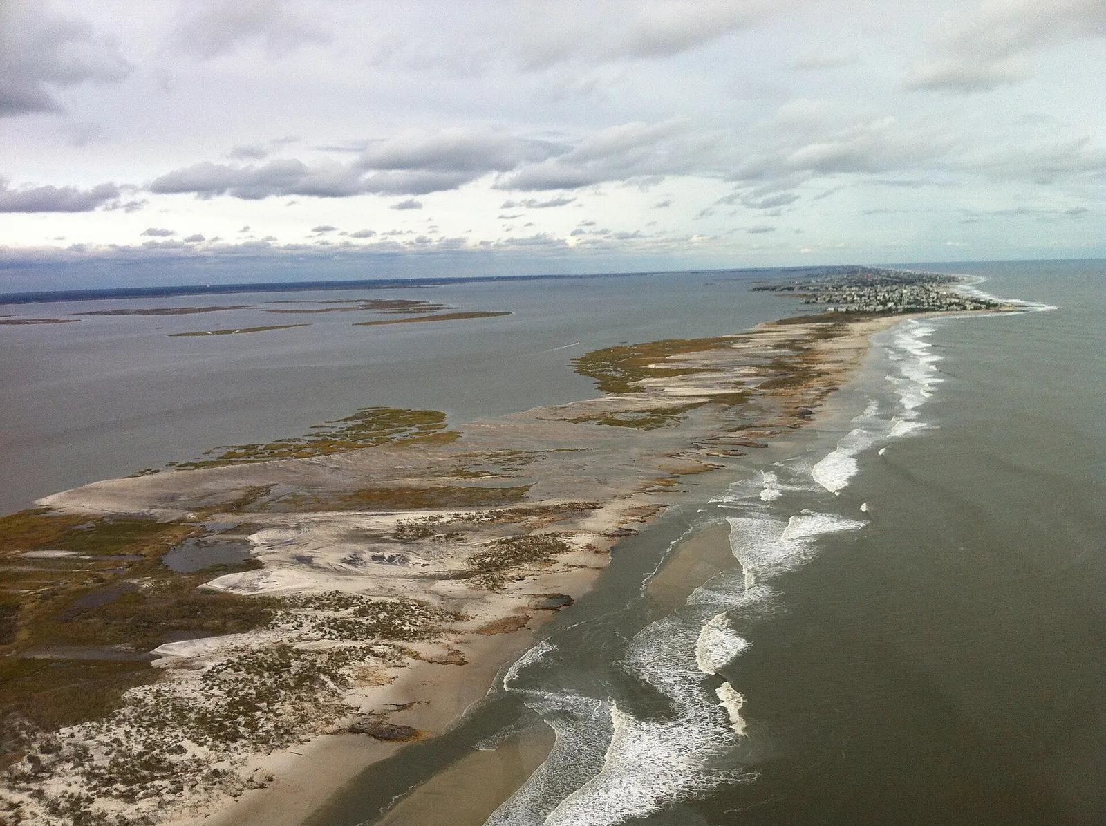 Aerial view of the Holgate tip of Long Beach Island, sandy flats and marsh reaching south into the inlet