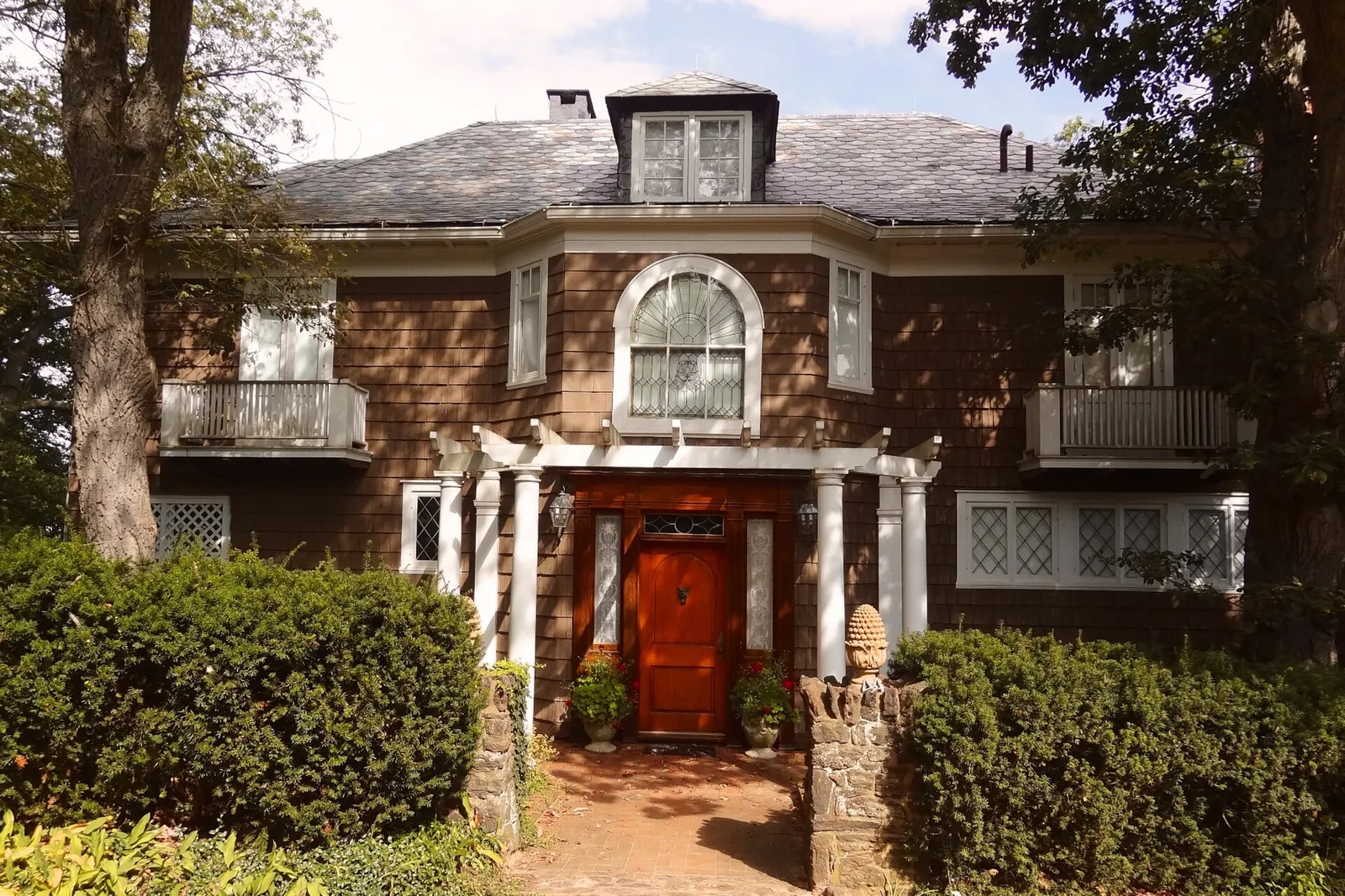 A shingled early 1900s house in the Water Witch Club Historic District in Monmouth Hills
