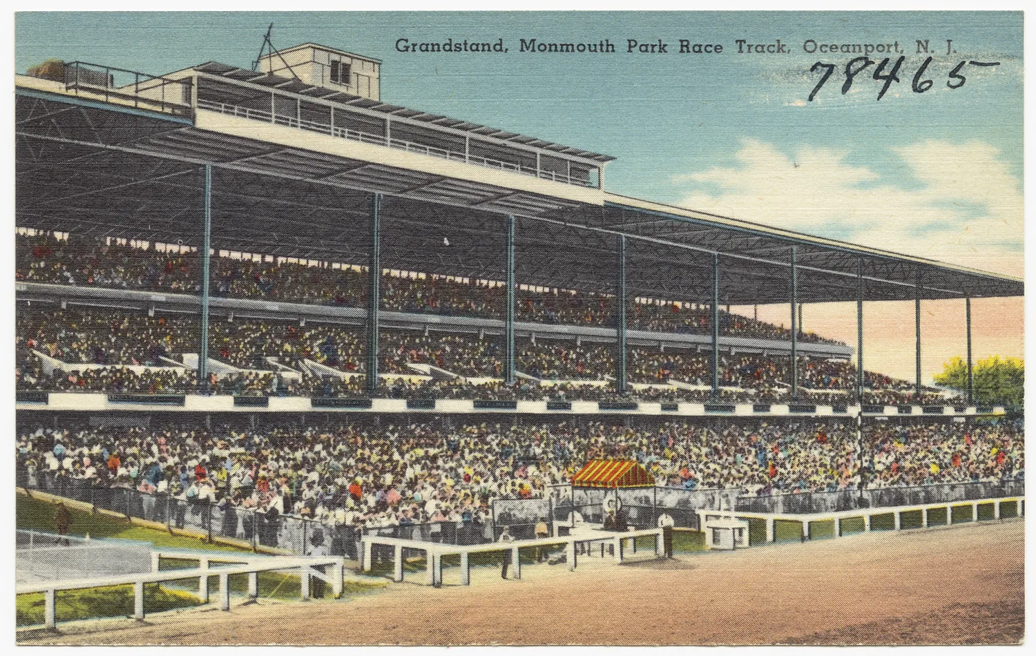 Vintage postcard of the crowded grandstand at Monmouth Park Race Track