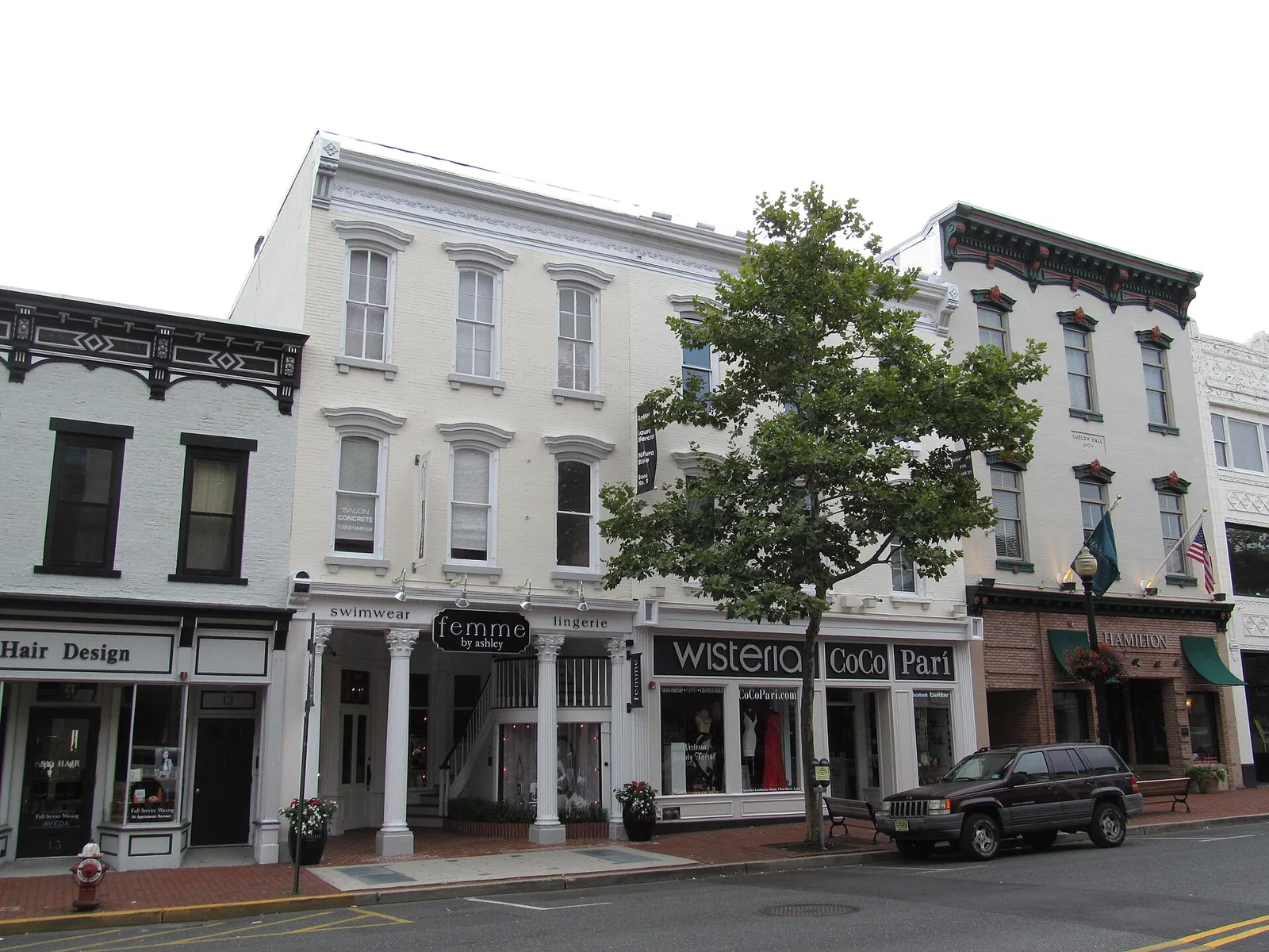 Restored two- and three-story storefronts with shops at street level in downtown Red Bank