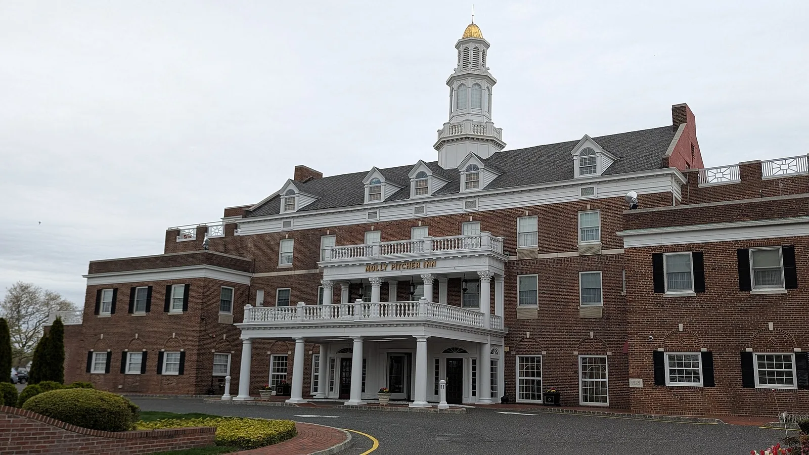 The red-brick Molly Pitcher Inn with its white columns and cupola